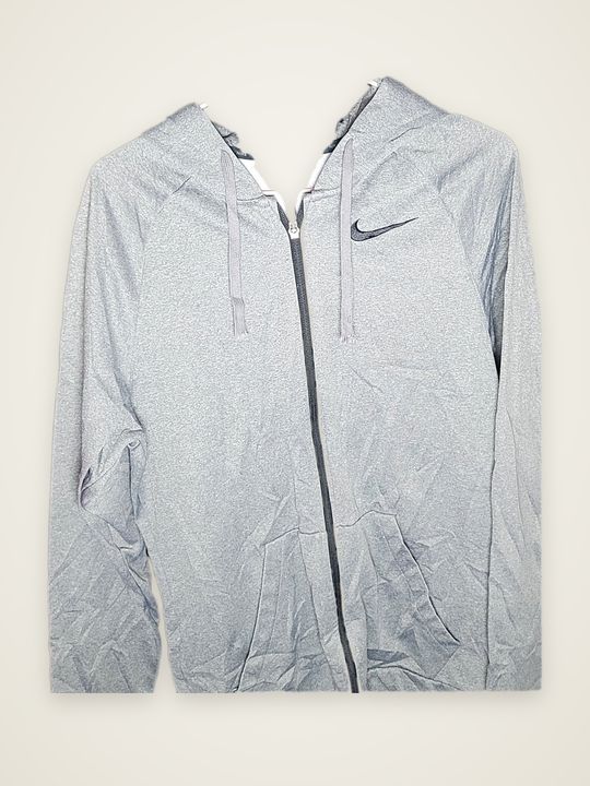 Chaqueta Nike gris jaspeado con cierre colgado en el estudio Maully